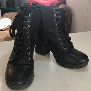 Black zip up ankle boots